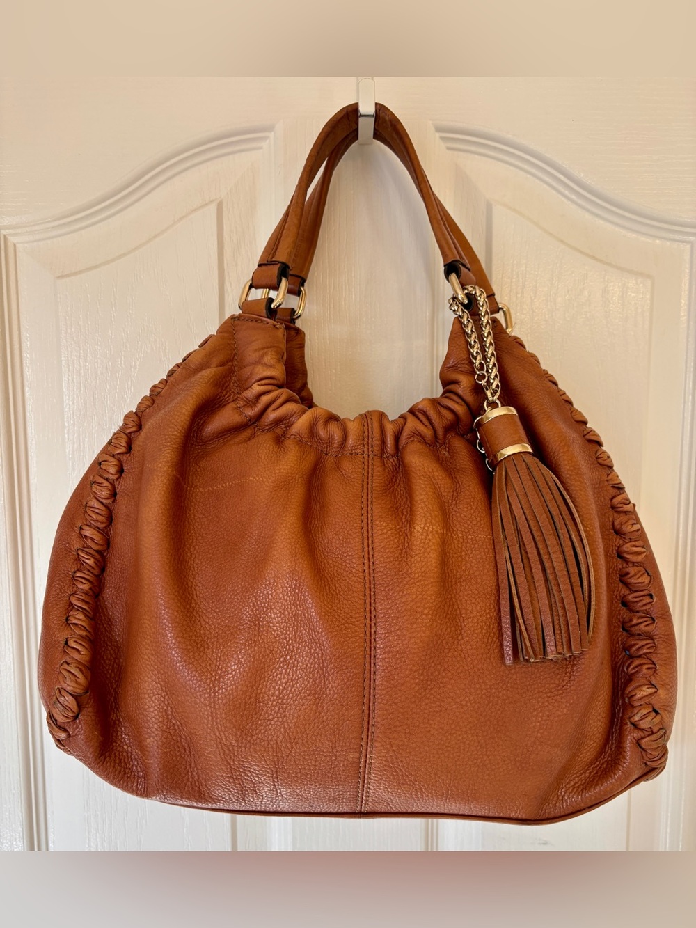 Antonio Melani Tassel Hobo Bag in Cognac Brown